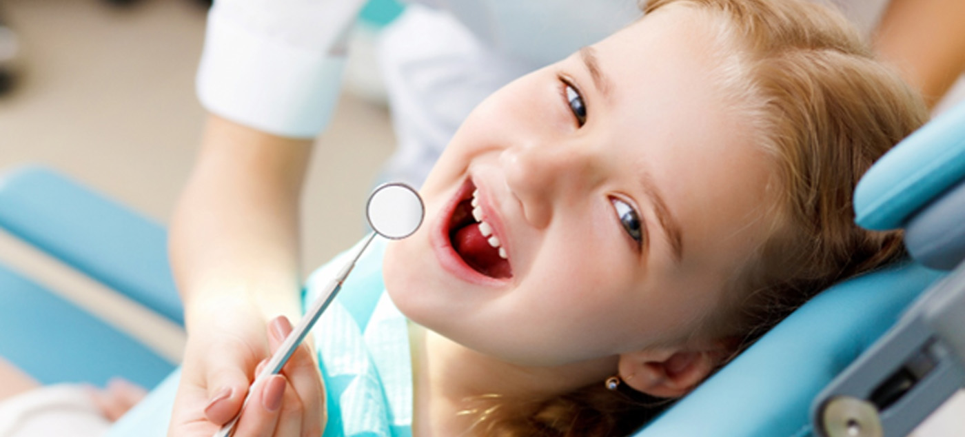 A little girl at the dentist