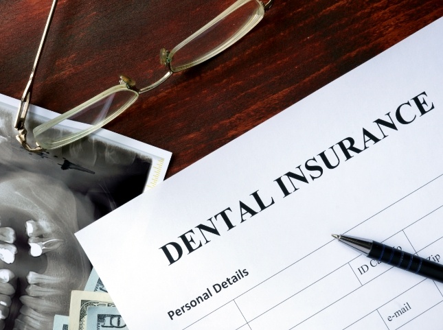 Dental insurance form on desk