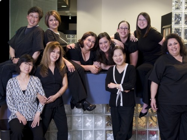 Smiling dental team members at Newpark Mall Family Dental Group