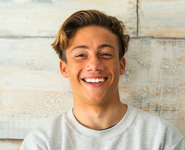 Male teenager smiling